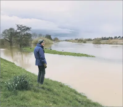  ??  ?? Nether Poppleton resident Howard Chant on flooded land near the River Ouse, near to the village.