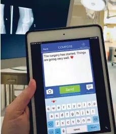  ?? KIMBERLY MEADOWS ?? Nurses at Lakewood Ranch (Fla.) Medical Center use a mobile app to text patients’ loved ones with updates during surgical procedures.