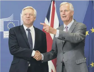  ??  ?? EU chief Brexit negotiator Michel Barnier, right, with British Secretary of State David Davis.