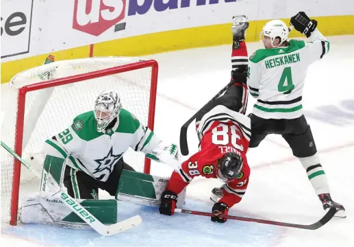  ?? GETTY IMAGES ?? Brandon Hagel and the rest of the Hawks were blanked by Stars goalie Jake Oettinger on Friday night. Marc-Andre Fleury picked up a loss and a shutout.