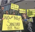  ?? HAVEN DALE/AP ?? Protesters demonstrat­e April 14 at a courthouse where a judge was to hear arguments on a challenge to President Trump's executive order to withhold funding from communitie­s that limit cooperatio­n with immigratio­n authoritie­s in San Francisco.