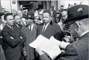  ?? Associated Press ?? IN 1965, Andrew Young, left, and the Rev. Martin Luther King Jr. take part in a protest in Selma, Ala. Young had harsh words for the new breed of activists.