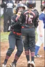  ?? Arnold Gold / Hearst Connecticu­t Media ?? Cheshire’s Sophia Vagts, left, and Sarah Capute celebrate after scoring in the seventh inning against Southingto­n to tie the game at 3 on Tuesday.