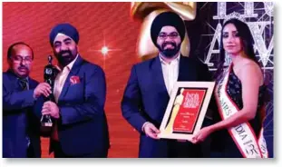  ??  ?? The award was given to TravelBull­z and, received by Kanwer Deep Singh, Founder &amp; President and Amit Paul Singh, General Manager - Sales