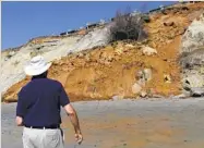  ?? BILL WECHTER ?? Resident Sheldon Krueger looks at a section of coastal bluff that collapsed south of Fourth Street in Del Mar.