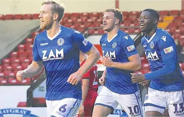  ?? Peter Hilton Photograph­y ?? Jamie Grimes celebrates after his opening goal in the 3-3 draw at the Banks’ Stadium