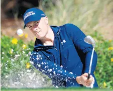  ?? JARED C. TILTON/ ?? Jordan Spieth plays a shot from a greenside bunker on the 14th hole during the second round of the Players Championsh­ip on Saturday on the Stadium Course at TPC Sawgrass in Ponte Vedra Beach, Florida.
