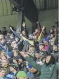  ?? ?? BACKING: Town supporters at Meadow Lane on Tuesday.