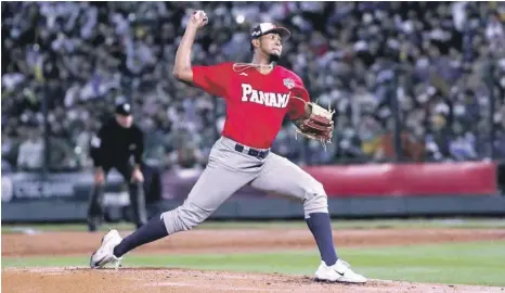  ?? ?? Humberto Mejía, de Panamá, aparece en acción en el partido frente a Taiwán en el Clásico Mundial de Béisbol.