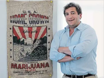  ?? CHARLES REX ARBOGAST THE ASSOCIATED PRESS ?? Ben Kovler, CEO of Green Thumb Industries, poses for a portrait at the company's office in Chicago. Green Thumb Industries, with $20 million in revenue from pot shops in seven states, turned its gaze north and went public in Canada, where marijuana...