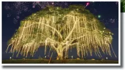  ?? ?? The Heritage tree stood majestic with its bright, radiant lights, enhanced further by a spectacula­r, colorful fireworks display, illuminati­ng the expansive grounds of Villar City.