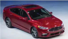  ??  ?? The redesigned Ford Fusion includes a Sport edition, with a 2.7-L twin-turbo V6 Ecoboost engine, good for 325 hp and 350 lb.-ft. of torque.