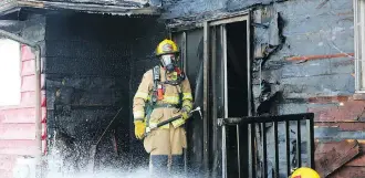  ?? GAVIN YOUNG ?? Firefighte­rs knocked down a fire at a home on the 8000 block of Centre Street N. on Sunday.
