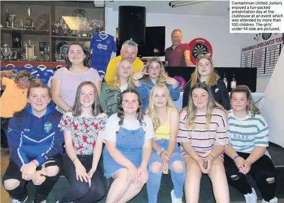  ??  ?? Cwmamman United Juniors enjoyed a fun-packed presentati­on day at the clubhouse at an event which was attended by more than 100 children. The girls’ under-14 side are pictured.