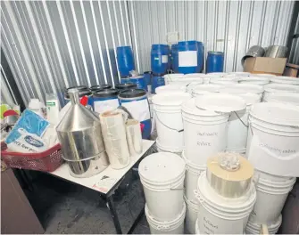  ??  ?? RIGHT Buckets containing other unknown substances are found at POS Cosmetics (Thailand) in Krathum Baen district, Samut Sakhon. The firm was among five firms supplying Magic Skin Co.