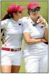  ?? NWA Democrat-Gazette/DAVID GOTTSCHALK ?? Arkansas’ Maria Fassi talks with Coach Shauna Taylor during Monday’s third round of the NCAA women’s golf championsh­ip in Fayettevil­le. “I told Shauna I don’t know how many times that we would walk down 18 holding hands and I’d be national champion,” Fassi said. “I dreamed it, but this was so much better, way better than what I dreamed.”