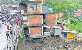  ?? ?? Property damaged due to flash flood in Kullu’s Anni on Thursday; and (right) a collapsed portion of ShimlaKalk­a highway at Samlech in Solan.