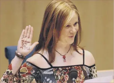  ?? Picture: PA ?? Rosie Kane makes her oath to the people. Times have changed since 2003