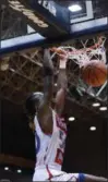  ?? PATRICK HOPKINS — FOR THE NEWS-HERALD ?? VASJ’s Khalil Mitcham dunks March 13 during a 66-62 Division II regional semifinal win over Benedictin­e in Canton.