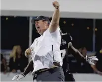  ?? STEPHEN M. DOWELL/ORLANDO SENTINEL ?? UCF coach Josh Heupel celebrates after winning the AAC Championsh­ip game of UCF versus Memphis at Spectrum Stadium in Orlando.