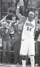  ?? SARAH PHIPPS ?? Chris Wilcox (54) celebrates a Thunder win against the Golden State Warriors on Dec. 31, 2008, at the Ford Center in Oklahoma City.