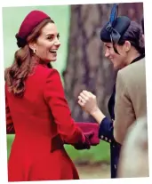  ??  ?? Helping hand: Relations between the duchesses seemed warm with Meghan offering a friendly gesture when she touched Kate’s back