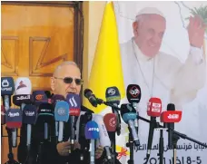  ?? Reuters ?? Cardinal Louis Raphael Sako speaking in Baghdad yesterday about the Pope’s Iraq visit