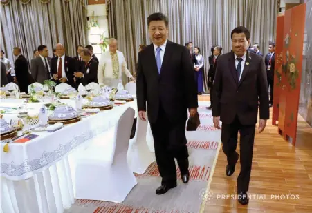  ??  ?? President Rodrigo Roa Duterte is accompanie­d by President Xi Jinping during his recent visit to China. (Presidenti­al Photo)