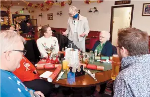  ?? ?? Theresa May MP at the Maidenhead & District Stroke Club's Christmas lunch. Stroke survivors are mask-exempt. Ref:134122-8