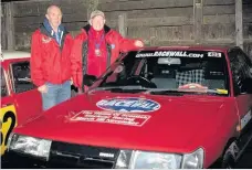  ??  ?? Alex and Claire Knox showed up to the Burns supper in their prized 1968 Singer Chamois