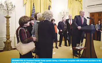  ?? —AFP ?? WASHINGTON: US President Donald Trump speaks during a Hanukkah reception with Holocaust survivors in the East Room of the White House.