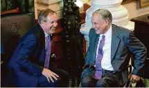  ?? Eric Gay/Associated Press ?? Attorney General Ken Paxton and Gov. Greg Abbott are picking candidates in the GOP primary who back their agendas.