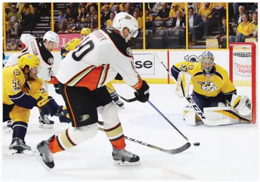  ??  ?? Corey Perry (10) of the Anaheim Ducks shoots the puck against Pekka Rinne (35) of the Nashville Predators during the second period in Game Four of the Western Conference Final in Nashville, Tennessee on Thursday. (AFP)