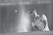  ?? PHELAN M. EBENHACK/AP PHOTO ?? Henrik Stenson hits out of a bunker onto the 17th green during the third round of the Arnold Palmer Invitation­al on Saturday at Orlando.