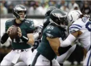  ?? MATT ROURKE — THE ASSOCIATED PRESS ?? Eagles quarterbac­k Carson Wentz wasn’t perfect Sunday, but he brought the poise and clutch playmaking that the Eagles have come to expect from him in a 20-16 win over the Colts in his first game back from injury.