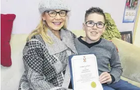  ?? LYNN CURWIN/TRURO NEWS ?? Jax Gaudet was excited about meeting MLA Lenore Zann and being presented with a certificat­e from the Nova Scotia Legislatur­e. Jax was recognized for his contributi­ons to the Children’s Wish Foundation, for having his story included in a book and for encouragin­g others to share their stories.