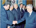  ??  ?? Postelnicu (left) shaking hands with Ceausescu: ‘I was an idiot,’ he explained