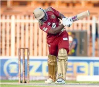  ??  ?? Andre Russell of Warriors plays a shot. —