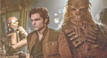  ?? LUCASFILM ?? Alden Ehrenreich as Han Solo with Chewbacca, played by Joonas Suotamo, in “Solo: A Star Wars Story.”