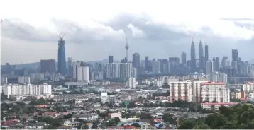  ?? — Bernama photo ?? For residentia­l properties, Knight Frank said the Kuala Lumpur’s prime housing market was generally holding firm and more property launches were expected amid improved market sentiment.