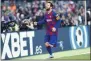  ?? JOAN MONFORT - THE ASSOCIATED
PRESS ?? Barcelona’s Lionel Messi celebrates after scoring his side’s second goal during a Spanish La Liga soccer match between Barcelona and Eibar at the Camp Nou stadium in Barcelona, Spain, Saturday Feb. 22, 2020.