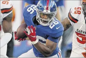  ?? Brad Penner / Associated Press ?? Giants running back Saquon Barkley makes his NFL debut Sunday vs. Jacksonvil­le, which had the No. 2 defense in the league last season.