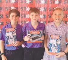  ?? ?? The winning trivia team Pierce McDonnell, Lincoln Coate and Grace Buckley (year 6) with their prizes. Pictures: Alison Williams