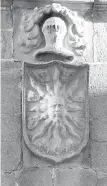  ??  ?? Escutcheon on the Casa del Sol, a 16th-century palace in Caceres. It is best to visit early or late in the day, as the sun reveals sculpted stone details such as this coat of arms.