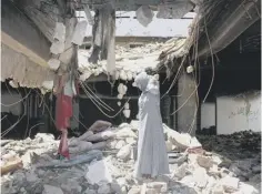  ?? ?? CONFLICT: A war-destoyed building in a southern Yemeni city