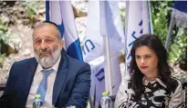  ?? (Yonatan Sindel/Flash90) ?? INTERIOR MINISTER Ayelet Shaked and outgoing minister Arye Deri attend their transition ceremony on Monday.