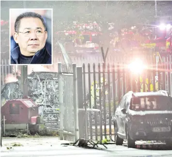  ?? — AFP photo ?? Emergency services work at the scene on the wreckage of a helicopter that crashed in a car park outside Leicester City Football Club’s King Power Stadium in Leicester. (Inset) Vichai Srivaddhan­aprabha.