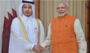  ?? PTI ?? WARM GREETINGS: Prime Minister Narendra Modi greets Qatar Prime Minister Sheikh Abdullah bin Nasser bin Khalifa Al Thani at Hyderabad House in New Delhi on Saturday. -