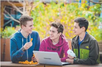  ?? Picture: Roy Vandervegt/AAP ?? IN THE KNOW: Australian Science and Mathematic­s School students Luke Bland, Jake Jolly and Giordan Staines.