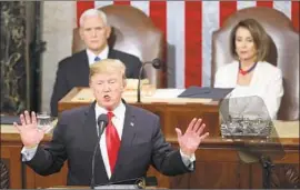  ?? Andrew Harnik Associated Press ?? PRESIDENT TRUMP has continued to demand $5.7 billion for a wall. Above, he delivers his State of the Union last week; House Speaker Nancy Pelosi is at right.